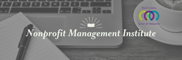 Close up of desk with lined notepad and pen, laptop keyboard, and white teacup. Text: Nonprofit Management Institute